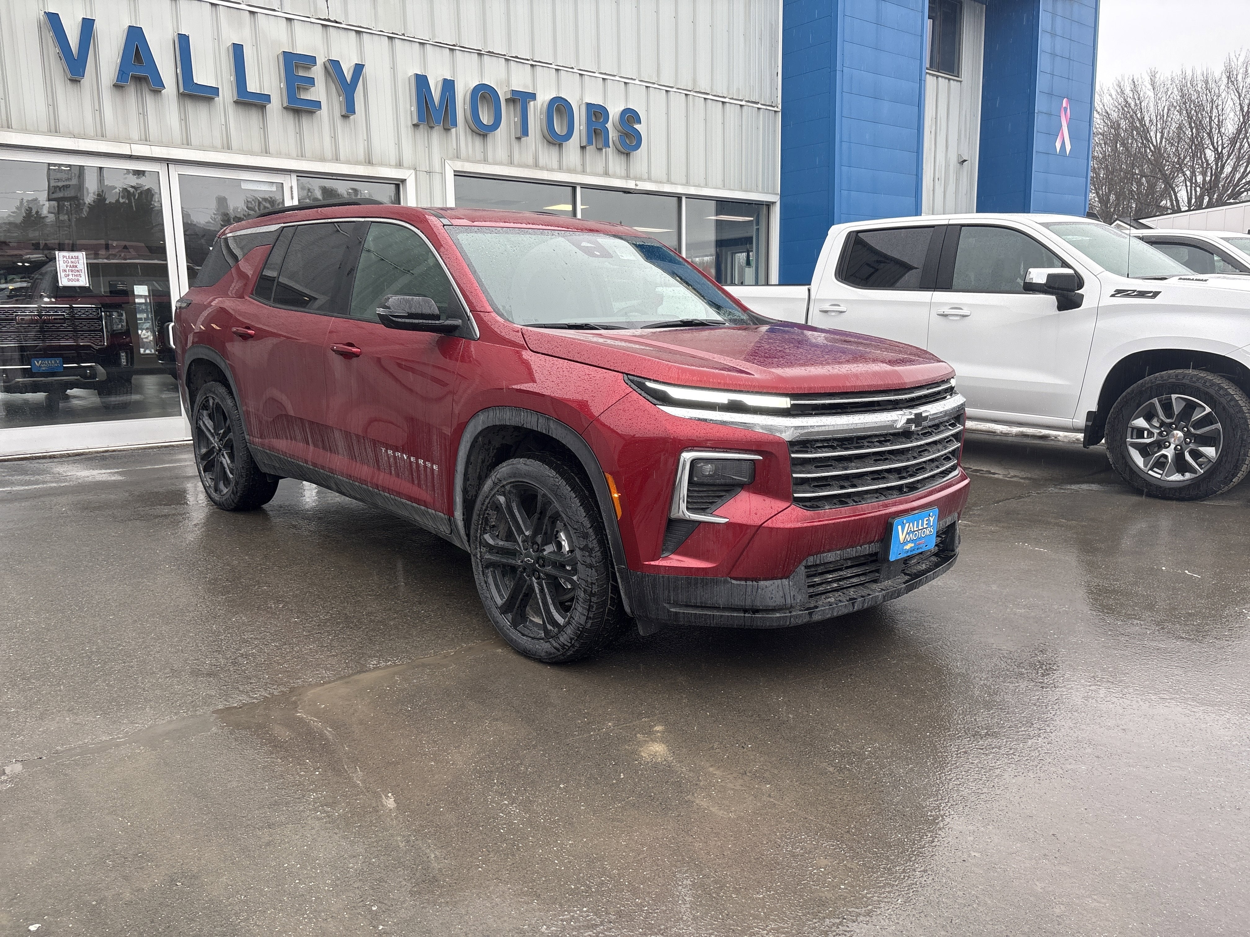 2026 Chevrolet Traverse LT in Radiant Red Tintcoat — front three-quarter view