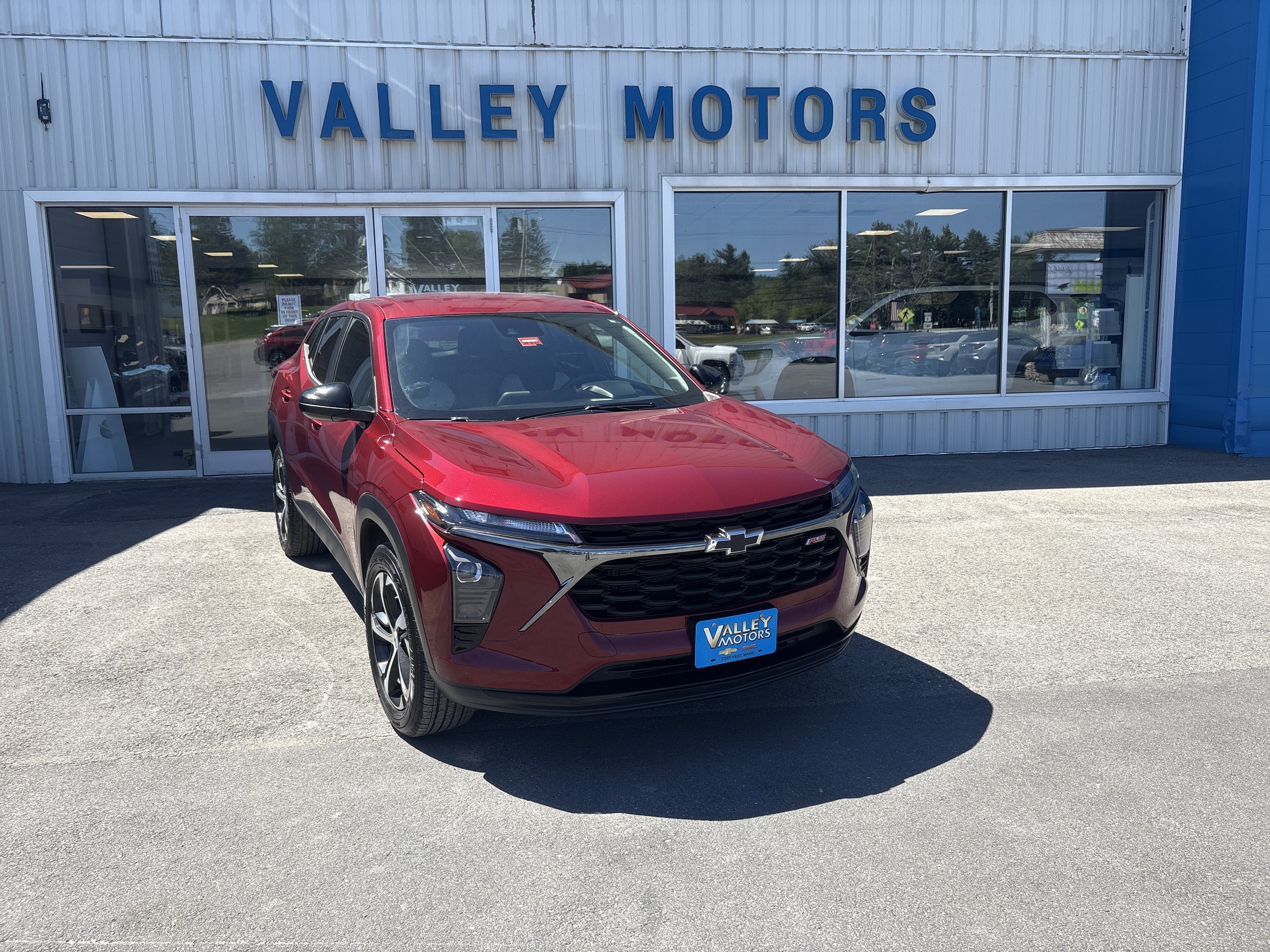 2025 Chevrolet Trax 1RS in Crimson Metallic — front three-quarter view