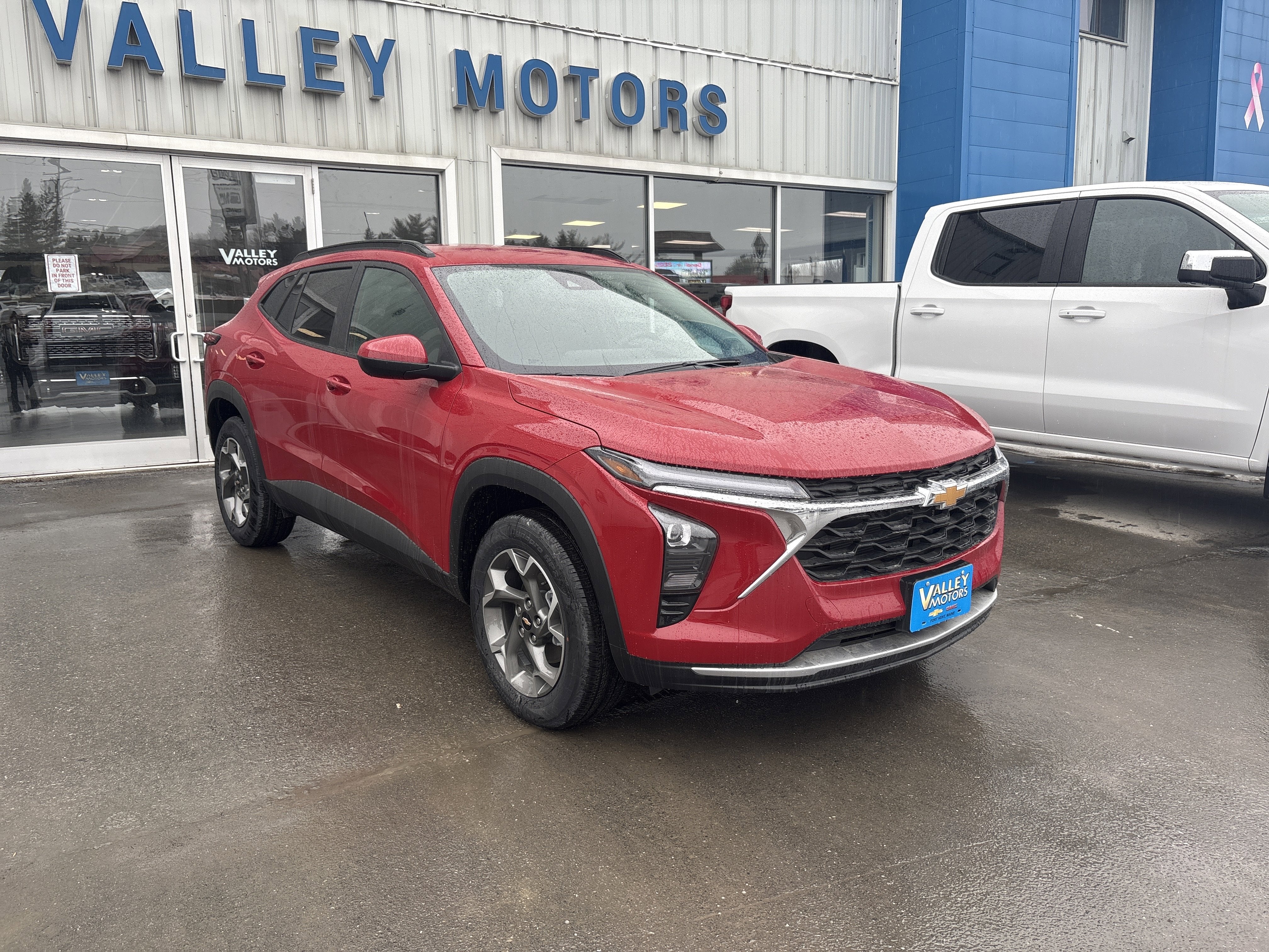 2026 Chevrolet Trax LT in Apex Red — front three-quarter view